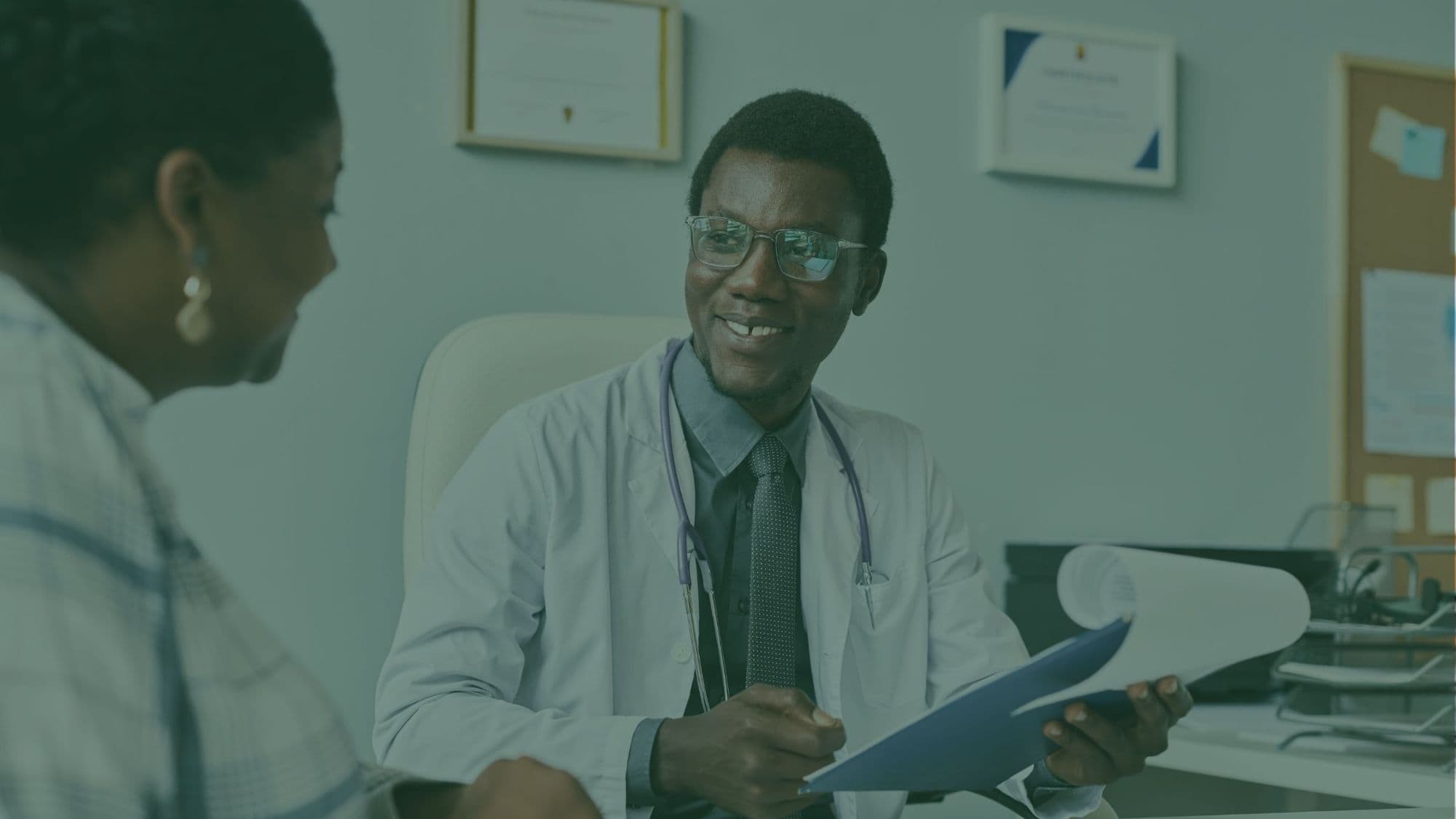 A clinical research physician reviewing trial results with a colleague