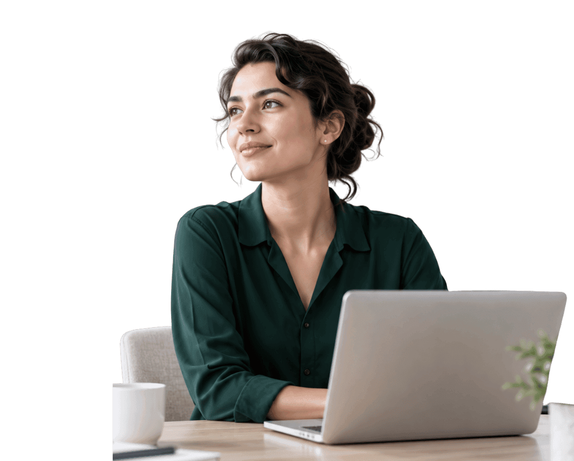 Professional at a laptop, looking ahead